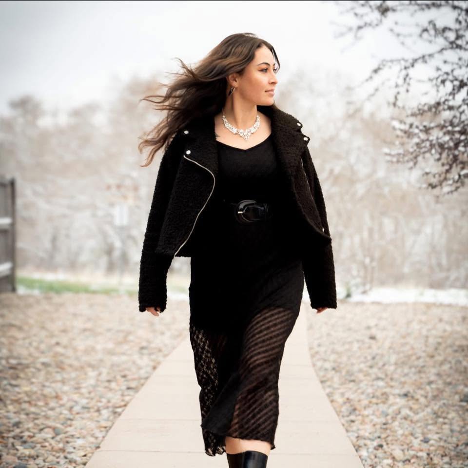 Danielle Luna walking outdoors in Colorado