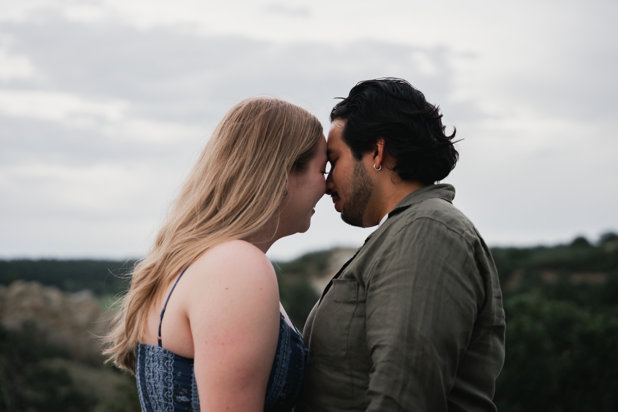 Couple touching foreheads in the Colorado foothills